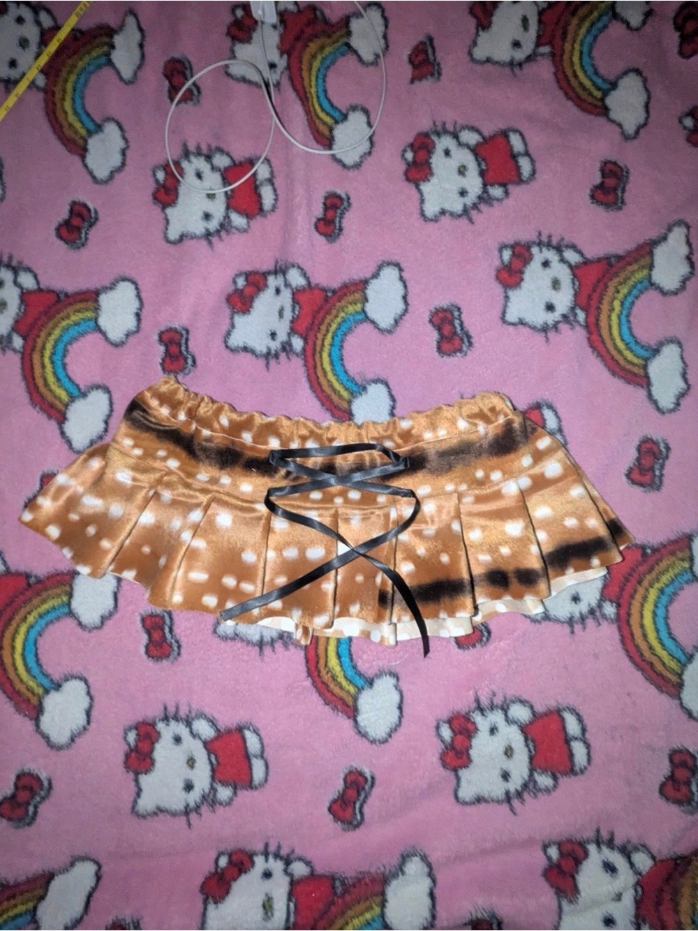 Fawn print pleated mini skirt
